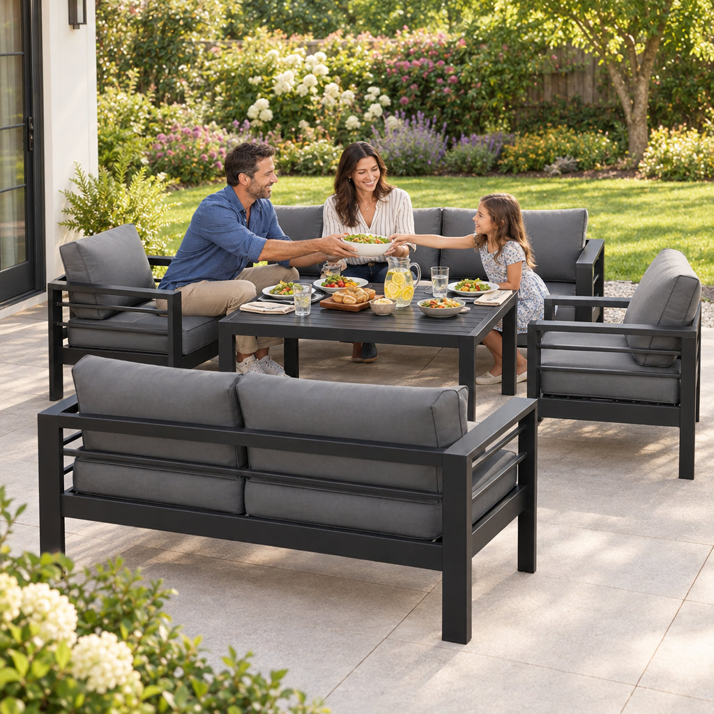 Aluminum Patio Furniture Set, couple and young child passing food and laughing around the table