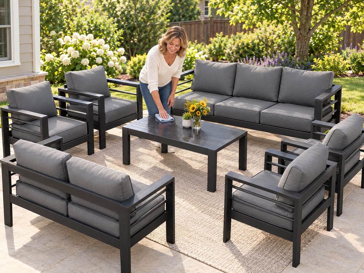 Aluminum Patio Furniture Set, woman running a damp cloth once across the tabletop, done in seconds
